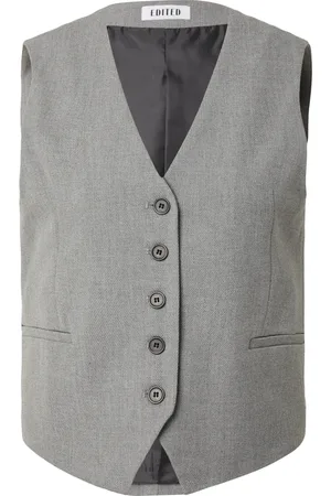 EDITED the label Chaleco para traje 