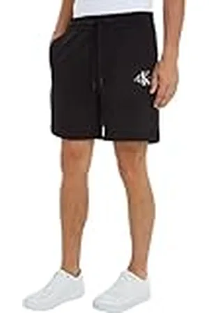 Calvin Klein Jeans Pantalones holgados Hombre cortos, Negro, XXS