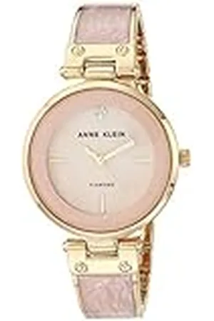 Anne Klein Reloj de pulsera rígida para mujer con esfera con diamante auténtico