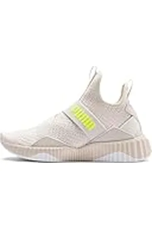 PUMA Defy Mid Core Wns, Zapatillas Deportivas para Interior Mujer, Blanco (Pastel Parchment White 06), 38.5 EU