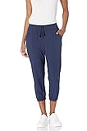 Amazon Pantalón Deportivo Corto de Tejido Elástico de Rendimiento - colores interrumpidos Mujer, , XS