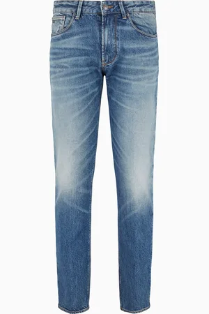 Emporio Armani Vaqueros J06 slim fit en denim elástico con lavado aclarado y tratamiento efecto sucio