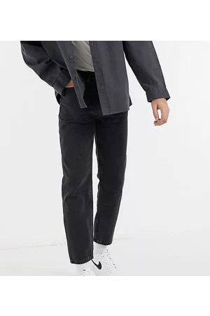 New Look Vaqueros rígidos con lavado negro de corte slim de