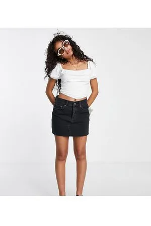 ASOS Minifalda vaquera con lavado de talle medio original de ASOS DESIGN Petite
