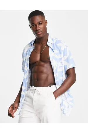 ASOS Camisa holgada con estampado floral grande de