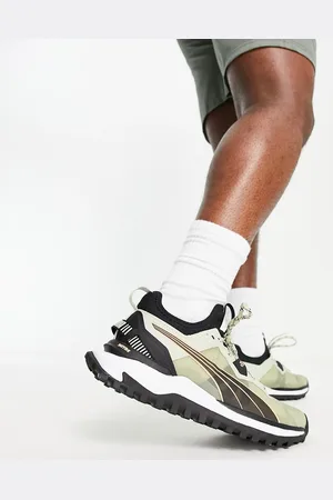 PUMA Zapatillas de deporte caquis y negras Voyage Nitro de Running