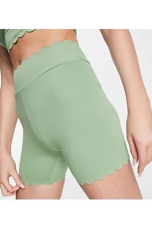 South Beach Leggings cortos verde oliva con bordes festoneados de poliéster de