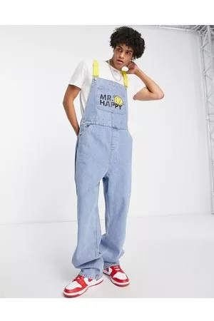 ASOS Peto holgado con lavado medio, logo de Mr. Feliz y tirantes en contraste de -Azul