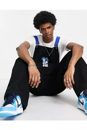 ASOS Hombre Tirantes - Peto largo holgado con tirantes en contraste y logo de Pat el cartero de