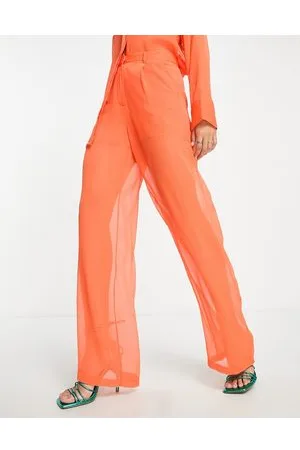 NA-KD Pantalones naranjas de pernera ancha transparentes de (parte de un conjunto)