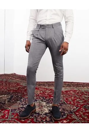 Noak Pantalones de traje azules de corte pitillo de tejido microtexturizado elástico en dos direcciones premium de