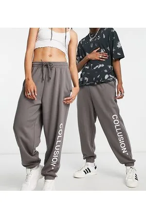 COLLUSION Joggers oscuro unisex con logo de