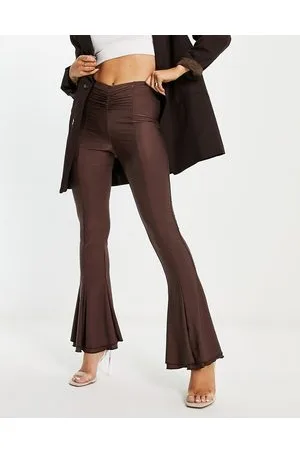 Annorlunda Pantalones de campana color chocolate intenso con acabado ultrabrillante de -Marrón