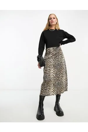 River Island Vestido con estampado de leopardo y diseño híbrido con jersey de