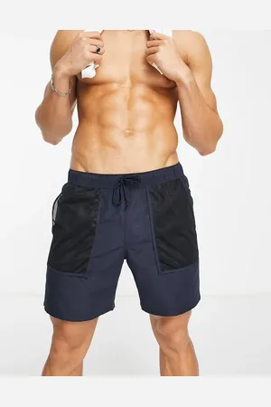 ASOS Shorts de baño de largo medio azul marino con bolsillos de malla de -Gris
