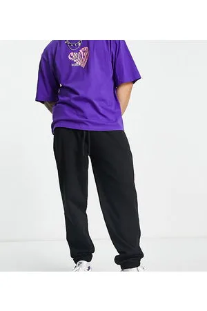 COLLUSION Joggers negros de