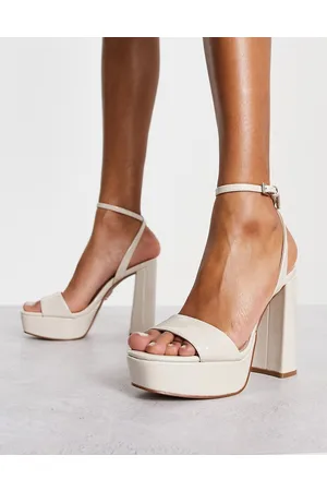 Steve Madden Sandalias color hueso acharolado de tacón con plataforma Lessa de -Beis neutro