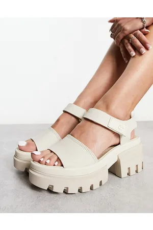 Timberland Sandalias blanco hueso con tira al tobillo de nobuk de cuero Everleigh de
