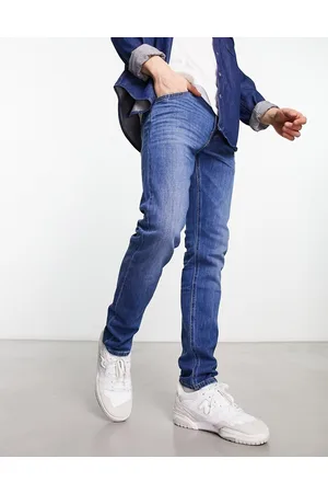 Lee Vaqueros con lavado medio vintage de corte tapered slim Luke de -Azul