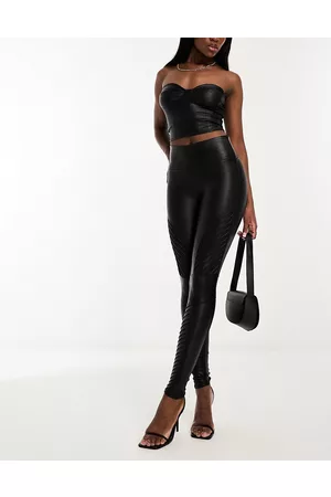 Spanx Leggings negros de estilo motero de cuero sintético de