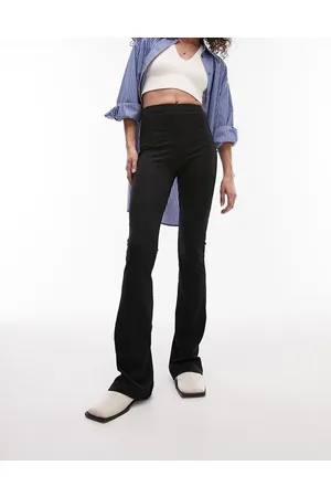 Topshop Pantalones pitillo negros de campana de canalé de