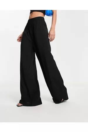 Urban classics Pantalones negros elásticos de pernera ancha de