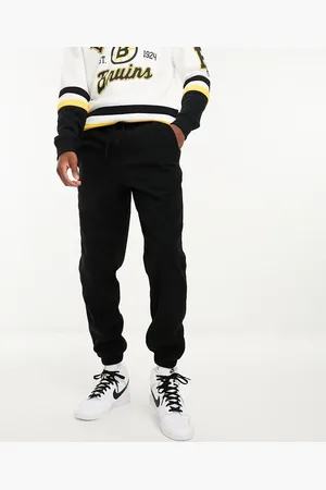 ASOS Joggers negros de corte tapered de felpa de