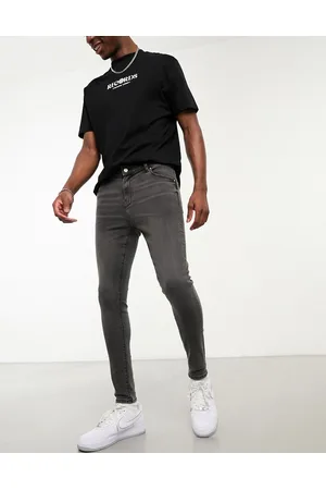 ASOS Vaqueros con diseño muy elástico en spray on de