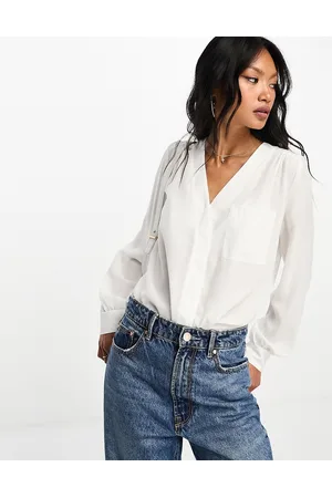 ASOS Blusa de manga larga con detalle de bolsillo en marfil de