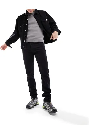 Calvin Klein Vaqueros negros de corte slim de