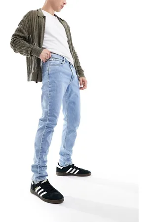 Calvin Klein Vaqueros tapered de corte slim con de -Azul
