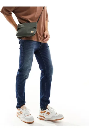 SELECTED Vaqueros azules con lavado medio de corte slim tapered de