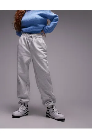 Topshop Joggers gris jaspeado extragrandes con bajos ajustados de