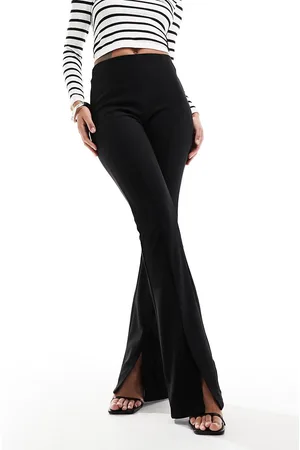 ONLY Pantalones negros estilo leggings de talle alto con abertura delantera de