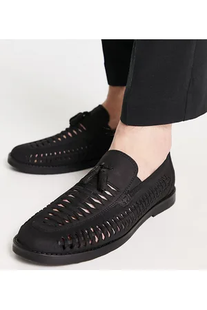 River Island Mocasines negros con diseño entretejido y borlas de Wide Fit