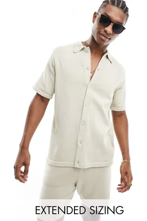 ASOS Polo color abotonado de punto de grosor medio de algodón de -Beis neutro