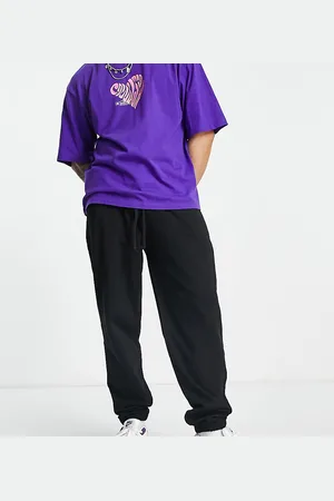 COLLUSION Joggers negros de