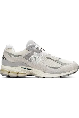 New Balance Zapatillas de deporte color hueso y gris 2002 de
