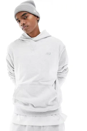 New Balance Sudadera con capucha de felpa rizada Athletics de