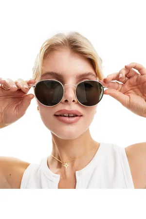 Weekday Gafas de sol doradas redondeadas unisex Explore de
