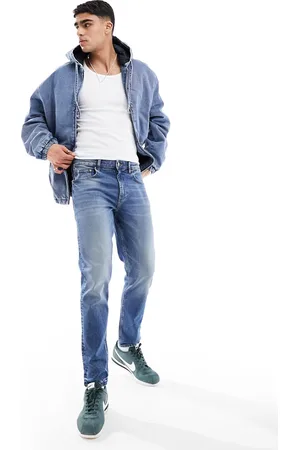 ASOS Vaqueros tapered con diseño elástico de