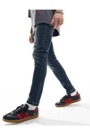 ASOS Vaqueros azules de corte pitillo con lavado tintado vintage de