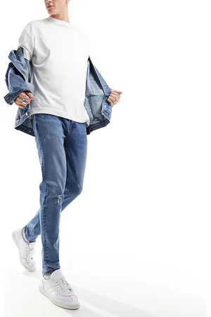 ASOS Vaqueros de corte pitillo con lavado azul oscuro y rodillas rasgadas de