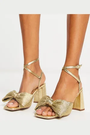 ASOS Sandalias doradas de tacón medio de bloque con detalle de lazo Hitched de