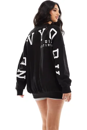 Missyempire Sudadera negra con estampado de texto "New York" en la espalda de Missy Empire