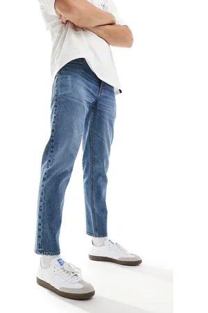 ASOS Vaqueros tapered azul lavado medio con diseño elástico de