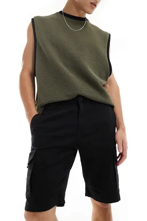 ADPT. Pantalones cortos cargo negros de pernera ancha de