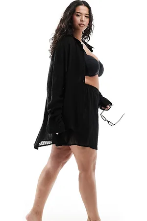 Esmée Pantalones cortos playeros negros a rayas transparentes de Esmée Plus (parte de un conjunto)
