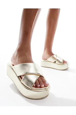 ASOS Sandalias doradas con diseño de tiras cruzadas acolchadas y plataforma plana Thunder de