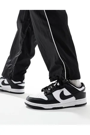 Nike Zapatillas de deporte negras y blancas Dunk Low Retro de -Negro